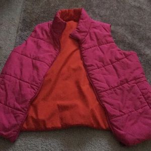 A orange and pink vest